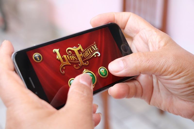A person playing game on a smartphone